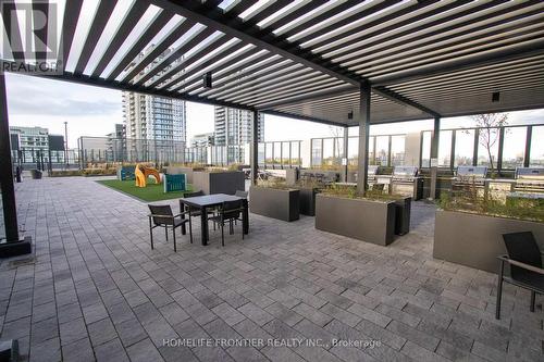 211 - 36 Zorra Street, Toronto, ON - Outdoor With Deck Patio Veranda With Exterior