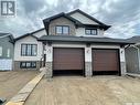 819 Woods Crescent, Warman, SK  - Outdoor With Facade 