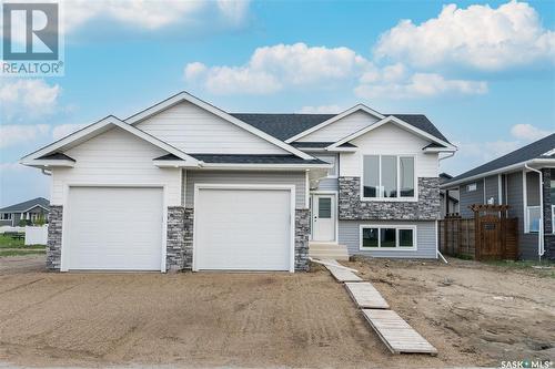 814 Weir Crescent, Warman, SK - Outdoor With Facade