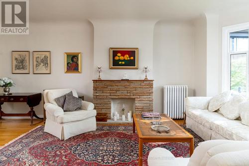 118 Pricefield Road, Toronto, ON - Indoor Photo Showing Living Room With Fireplace