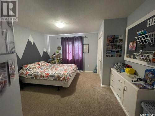 212 4Th Avenue E, Kindersley, SK - Indoor Photo Showing Bedroom