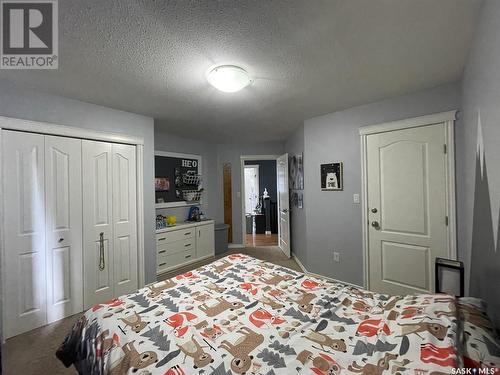 212 4Th Avenue E, Kindersley, SK - Indoor Photo Showing Bedroom