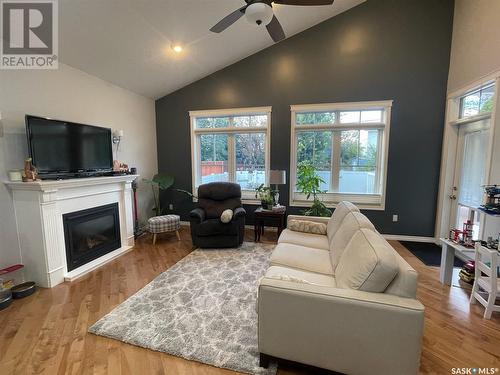 212 4Th Avenue E, Kindersley, SK - Indoor Photo Showing Living Room With Fireplace