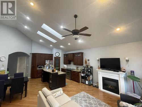 212 4Th Avenue E, Kindersley, SK - Indoor Photo Showing Living Room With Fireplace