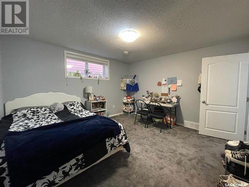 212 4Th Avenue E, Kindersley, SK - Indoor Photo Showing Bedroom