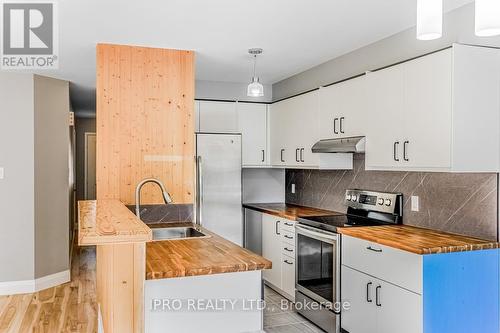 16 - 5950 Glen Erin Drive, Mississauga, ON - Indoor Photo Showing Kitchen