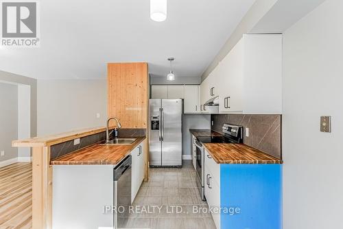 16 - 5950 Glen Erin Drive, Mississauga, ON - Indoor Photo Showing Kitchen