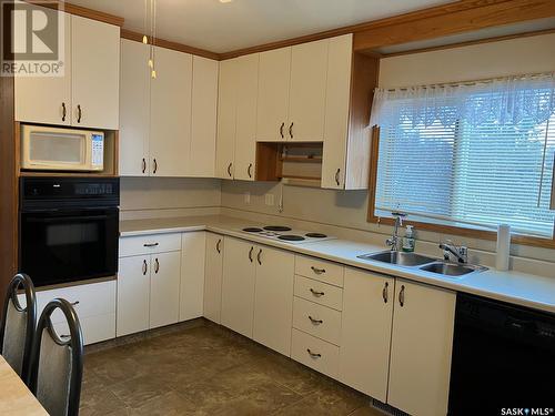 624 1St Avenue W, Nipawin, SK - Indoor Photo Showing Kitchen With Double Sink