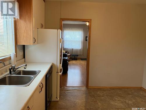 624 1St Avenue W, Nipawin, SK - Indoor Photo Showing Kitchen With Double Sink