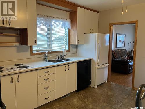 624 1St Avenue W, Nipawin, SK - Indoor Photo Showing Kitchen With Double Sink