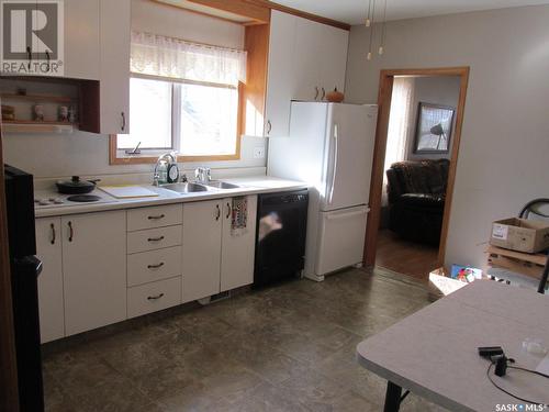 624 1St Avenue W, Nipawin, SK - Indoor Photo Showing Kitchen With Double Sink