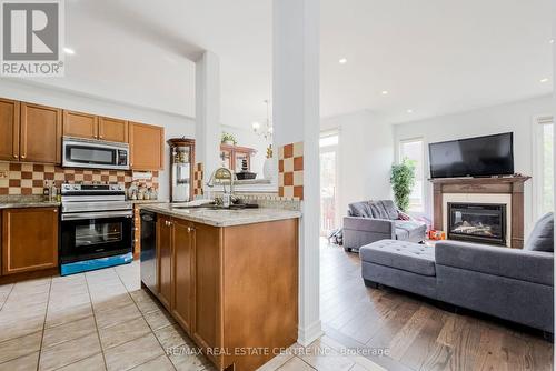 73 Pantomine (Upper Level) Boulevard, Brampton, ON - Indoor With Fireplace