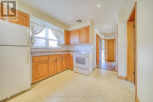 12 Martini Drive, Toronto, ON - Indoor Photo Showing Kitchen With Double Sink