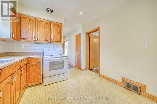 12 Martini Drive, Toronto, ON - Indoor Photo Showing Kitchen