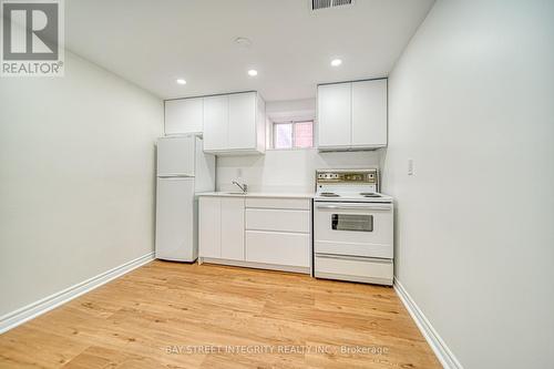 12 Martini Drive, Toronto, ON - Indoor Photo Showing Kitchen