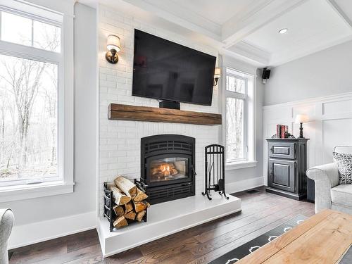 Living room - 536 Ch. St-Germain, Prévost, QC - Indoor Photo Showing Living Room With Fireplace