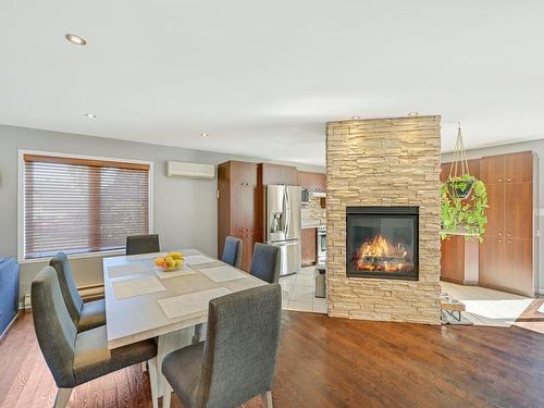 Dining room - 327 Rue Varin, Terrebonne (Lachenaie), QC - Indoor With Fireplace