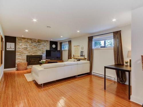 Family room - 164 Rue Frontenac O., Saint-Bruno-De-Montarville, QC - Indoor Photo Showing Living Room With Fireplace