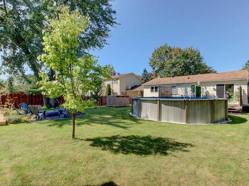 Pool - 164 Rue Frontenac O., Saint-Bruno-De-Montarville, QC - Outdoor With Above Ground Pool With Backyard