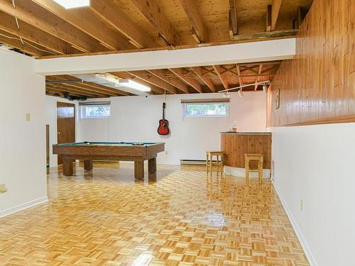 Salle familiale - 698 Rue Bran, Saint-Jérôme, QC - Indoor Photo Showing Basement