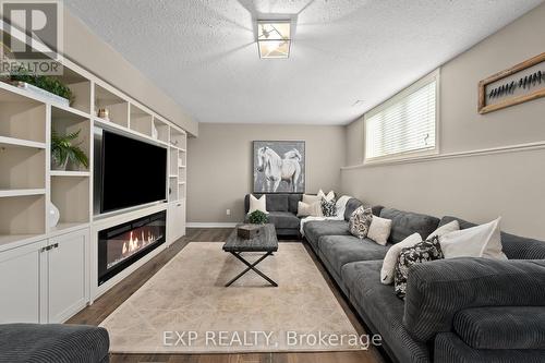 10 Deanna Drive, Wasaga Beach, ON - Indoor Photo Showing Living Room With Fireplace