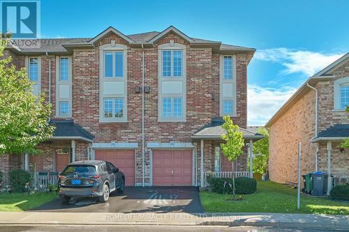 66 - 7385 Magistrate Terrace, Mississauga, ON - Outdoor With Facade