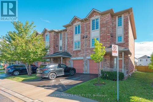 66 - 7385 Magistrate Terrace, Mississauga, ON - Outdoor With Facade