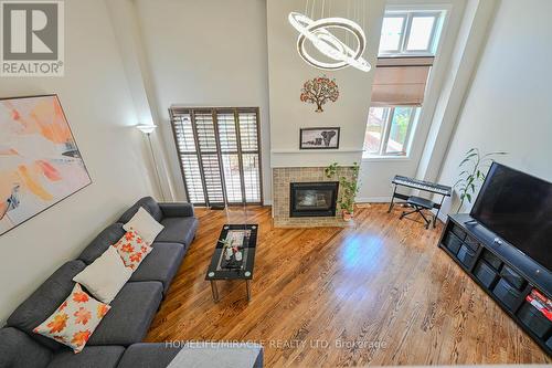 66 - 7385 Magistrate Terrace, Mississauga, ON - Indoor Photo Showing Living Room With Fireplace