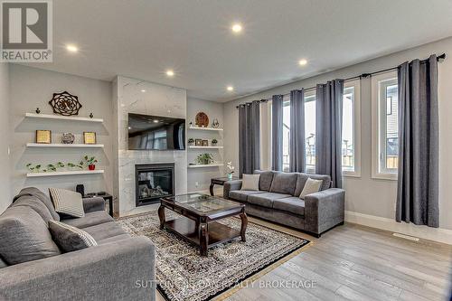 98 Locky Lane, Middlesex Centre (Komoka), ON - Indoor Photo Showing Living Room With Fireplace