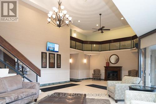 705 - 363 Colborne Street, London, ON - Indoor Photo Showing Living Room With Fireplace