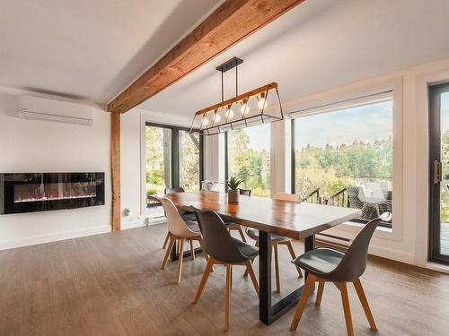 Salle Ã  manger - 159 Rue Custeau, Magog, QC - Indoor Photo Showing Dining Room With Fireplace