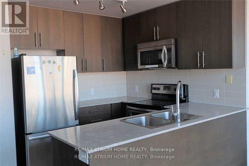 711 - 3985 Grand Park Drive, Mississauga, ON - Indoor Photo Showing Kitchen With Double Sink With Upgraded Kitchen