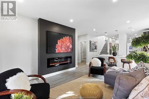 1206 Monmouth, Windsor, ON - Indoor Photo Showing Living Room With Fireplace