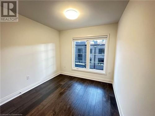 Spare room featuring dark hardwood / wood-style flooring - 258 Hespeler Rd Road Unit# 36, Cambridge, ON - Indoor Photo Showing Other Room