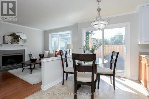 994 Quinton Place, London, ON - Indoor Photo Showing Dining Room With Fireplace