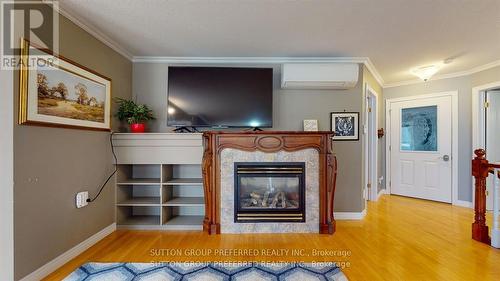 204 Third Street, West Elgin (Rodney), ON - Indoor Photo Showing Living Room With Fireplace