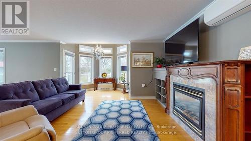 204 Third Street, West Elgin (Rodney), ON - Indoor Photo Showing Living Room With Fireplace