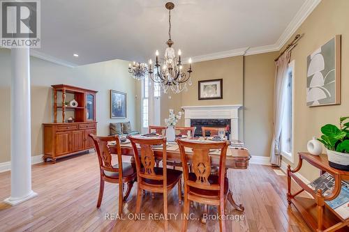 1033 Kestell Boulevard, Oakville, ON - Indoor Photo Showing Dining Room With Fireplace