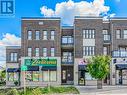 128 Burnhamthorpe Road E, Oakville, ON  - Outdoor With Facade 