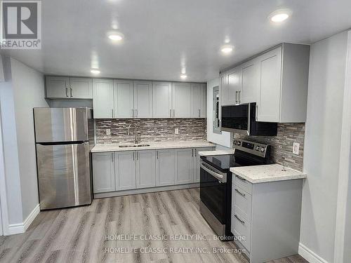 73 Hawkins Crescent, Ajax, ON - Indoor Photo Showing Kitchen With Double Sink With Upgraded Kitchen