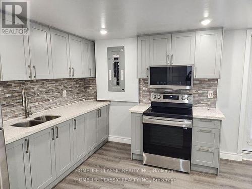 73 Hawkins Crescent, Ajax, ON - Indoor Photo Showing Kitchen With Double Sink With Upgraded Kitchen