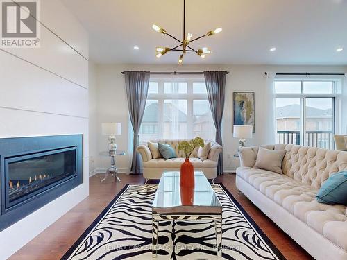 68 Kentledge Avenue, East Gwillimbury, ON - Indoor Photo Showing Living Room With Fireplace