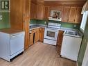 8 Cabot Street, St. Anthony, NL  - Indoor Photo Showing Kitchen With Double Sink 