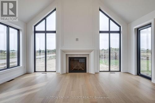 2 Five Stakes Street, Southwold (Talbotville), ON - Indoor Photo Showing Living Room With Fireplace