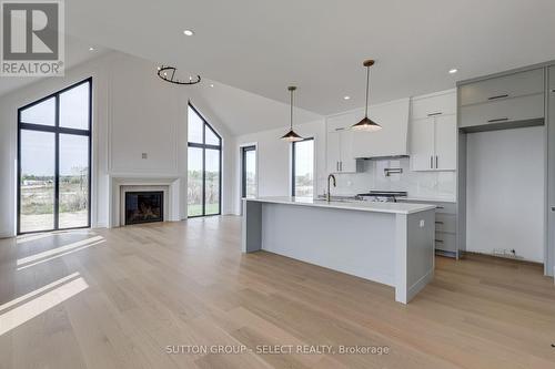 2 Five Stakes Street, Southwold (Talbotville), ON - Indoor Photo Showing Kitchen With Fireplace