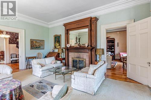 5 Emily Street, Kingston, ON - Indoor Photo Showing Living Room With Fireplace