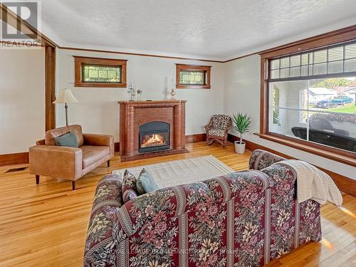 44 Mcgowan Street, Tweed, ON - Indoor Photo Showing Living Room With Fireplace