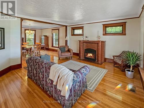 44 Mcgowan Street, Tweed, ON - Indoor Photo Showing Living Room With Fireplace