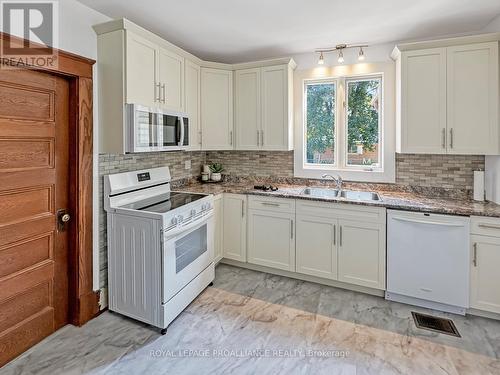 44 Mcgowan Street, Tweed, ON - Indoor Photo Showing Kitchen With Double Sink