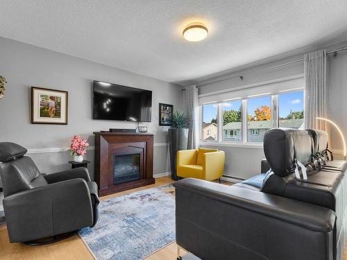 Salon - 4360 Rue Huberdeau, Longueuil (Saint-Hubert), QC - Indoor Photo Showing Living Room With Fireplace